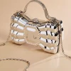 Women Versona Metallic Bow Bag