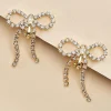 Women Versona Rhinestone Bow Clip On Earrings