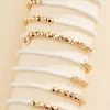 Women Versona White And Gold Beaded Bracelet Set